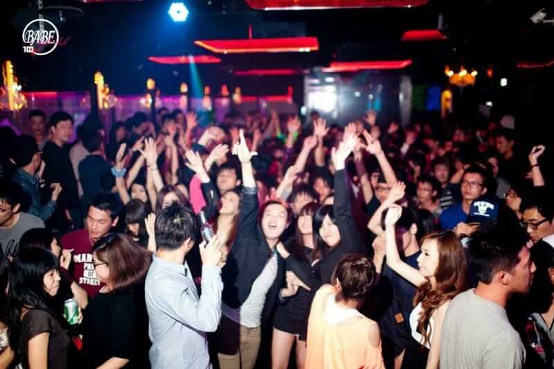 night club vibe with many people dancing in taipei